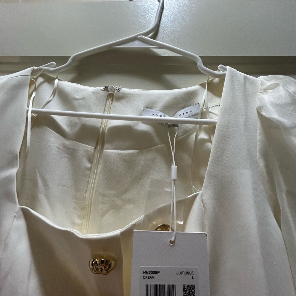 Brand new endless rose white jumpsuit